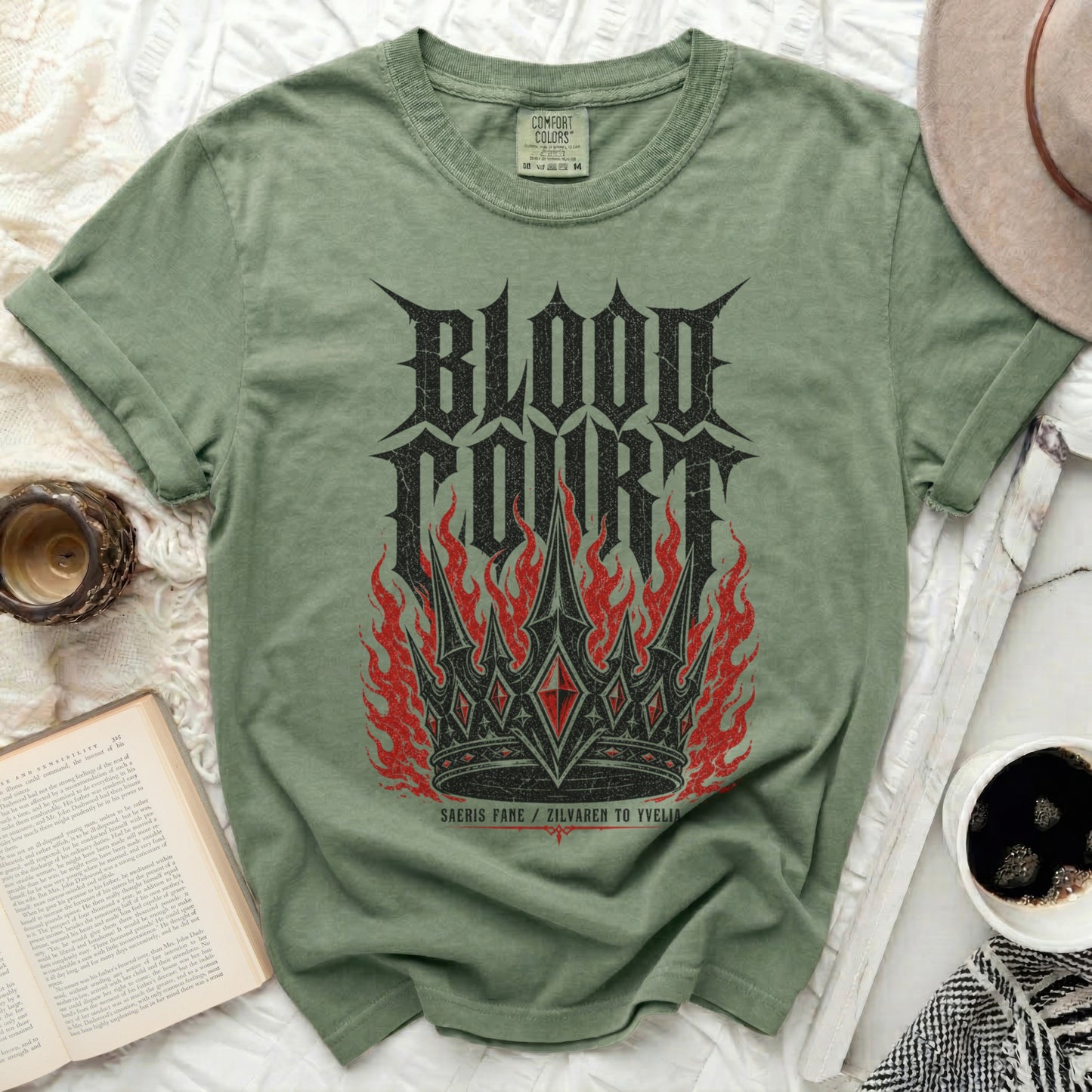 Olive green t-shirt with red "Blood Court" crown graphic and text.