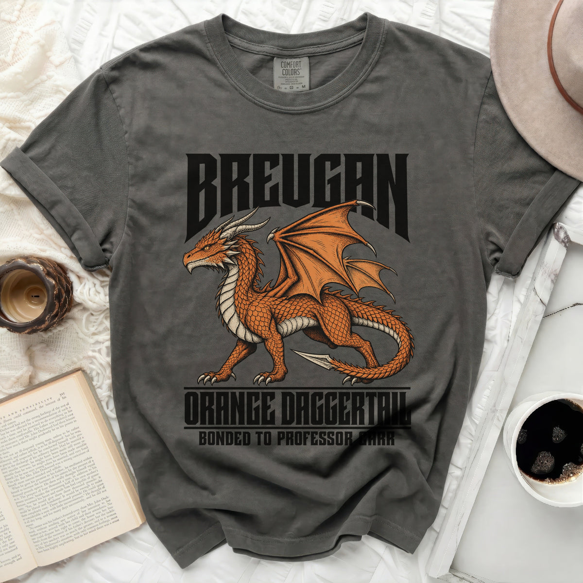 Grey t-shirt with orange dragon graphic and text "BREUGAN ORANGE DAGGERTAIL BONDED TO PROFESSOR CARR".
