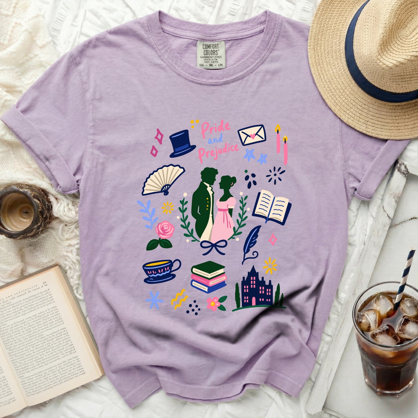 Lavender t-shirt with "Pride and Prejudice" print and bookish illustrations.