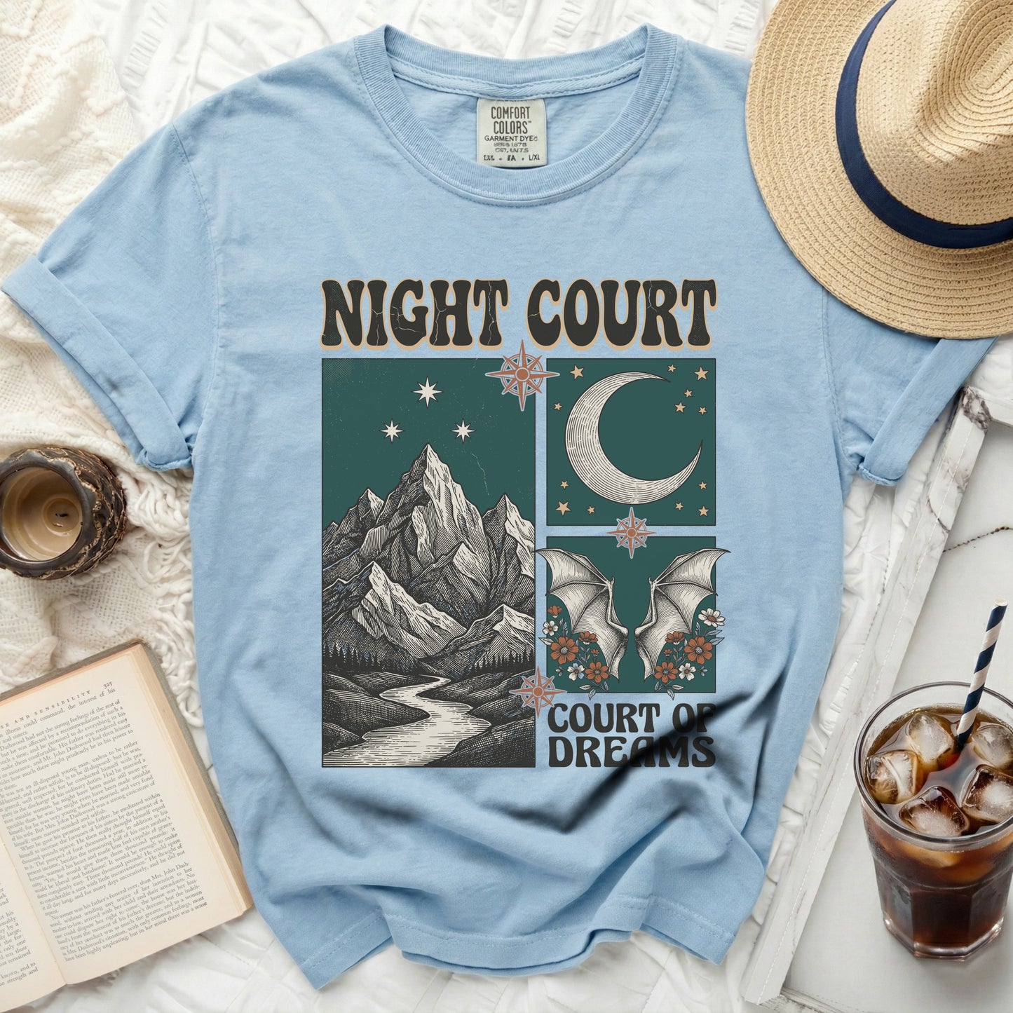 Light blue t-shirt with "Night Court Court of Dreams" and celestial mountain design.