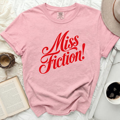 Pink comfort colors t-shirt with red "Miss Fiction!" graphic