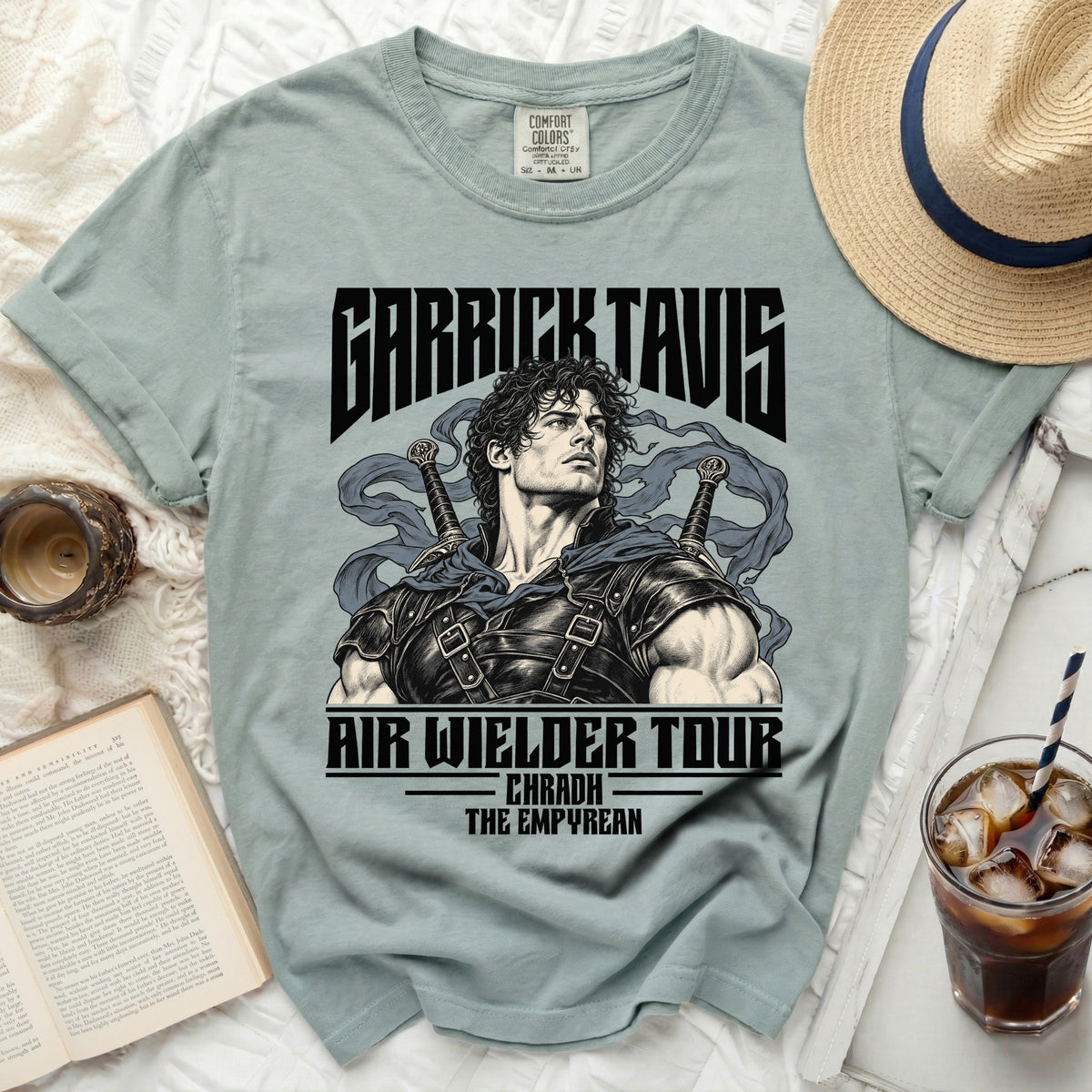 Light blue t-shirt featuring "Garrick Tavis Air Wielder Tour" with warrior graphic.