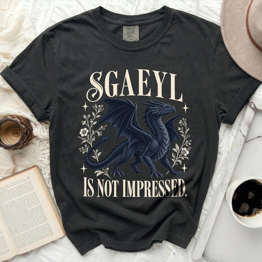 Black t-shirt with a dark dragon and text "SGAEYL IS NOT IMPRESSED."