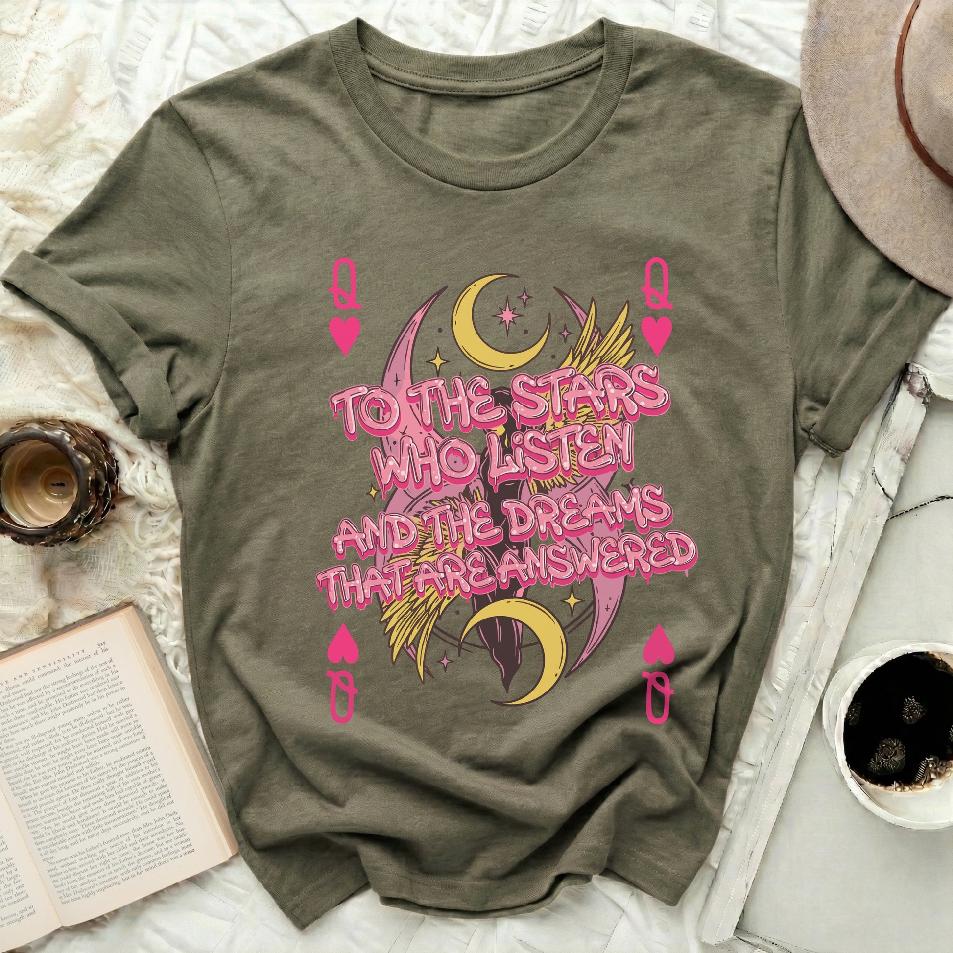 To The Stars Who Listen And Dreams That Are Answered product type
Stars Who Listen
Dreams Answered
Celestial Moon
Winged Design
Queen Hearts
Pink Text
Olive Green Tee
Inspirational Quote
Mystical Theme
Fantasy Style
Cosmic Vibes
Astrology Inspired
Spiritual Art
Aesthetic Graphic
Tarot Card Style
Unique Apparel
Tshirt Design
Graphic Shirt
Moon Phases
Magical Dreams