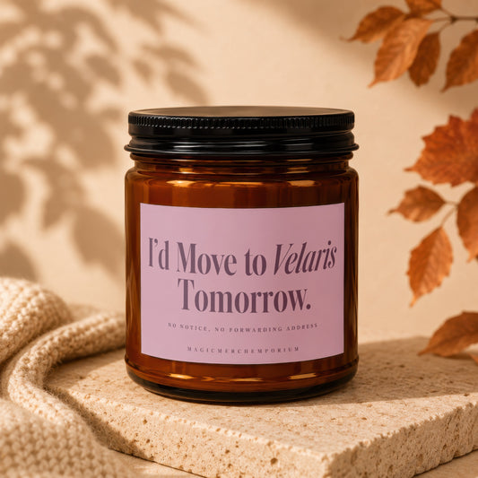 Amber candle in jar with pink label stating "I'd Move to Velaris Tomorrow."