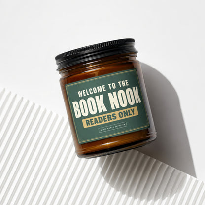 Amber jar candle with "Welcome to the Book Nook Readers Only" label.