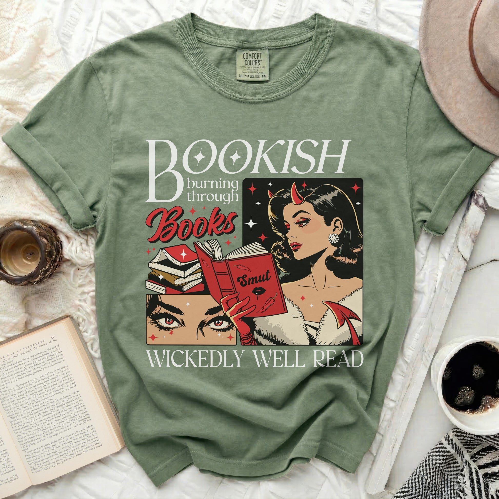 Green t-shirt with "Bookish Burning Through Books Smut Wickedly Well Read" graphic.