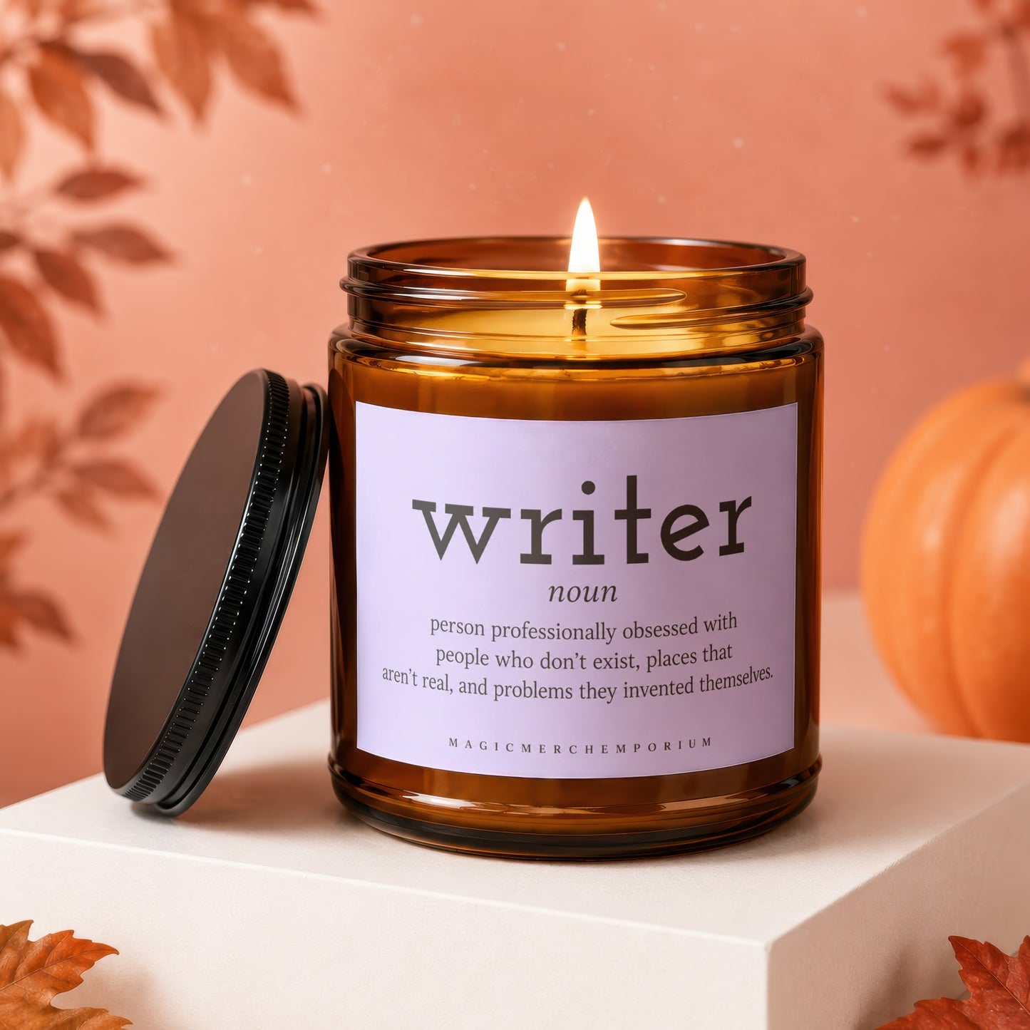Amber candle with "writer" definition label and flickering flame.