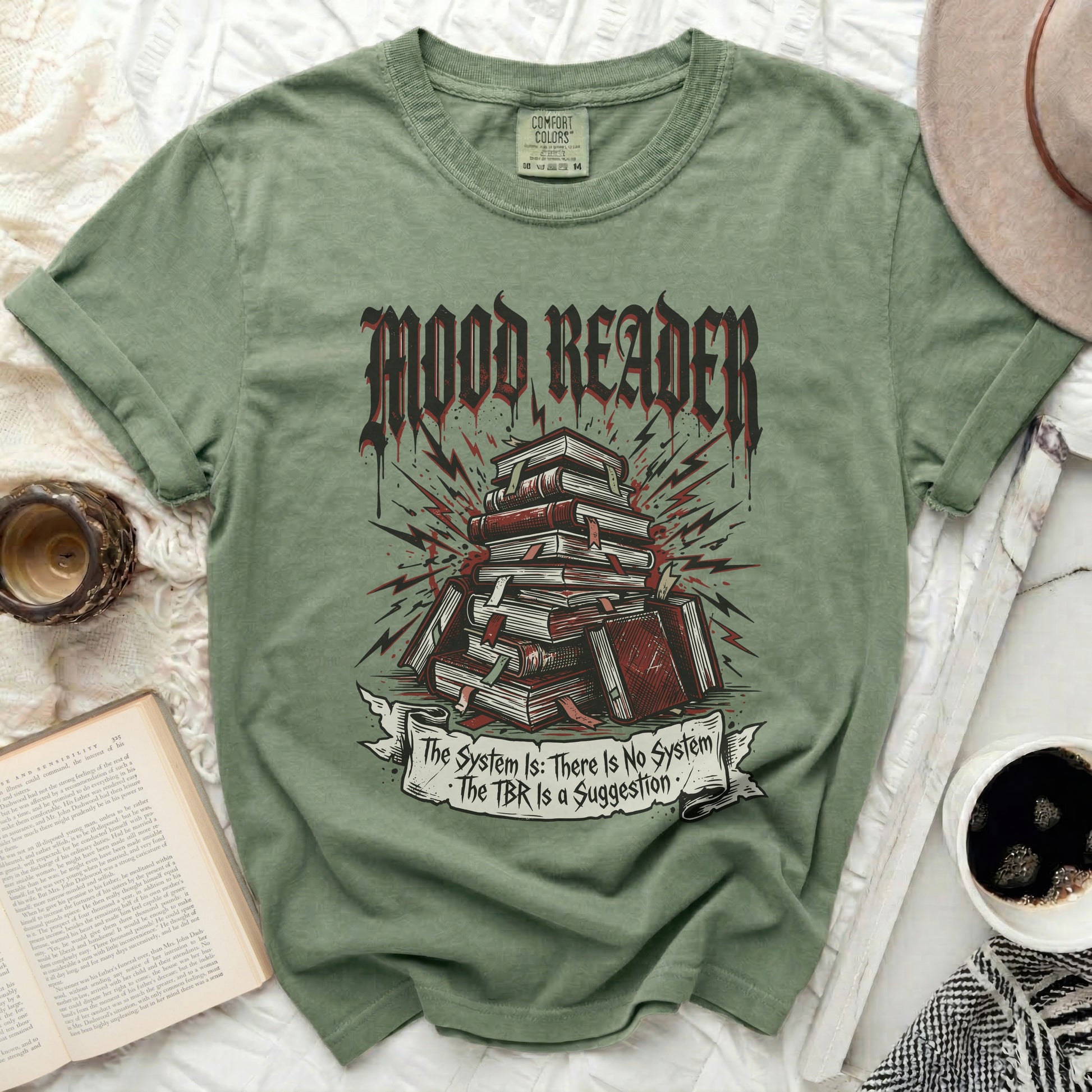 Green t-shirt with "Mood Reader" and stacked books graphic.