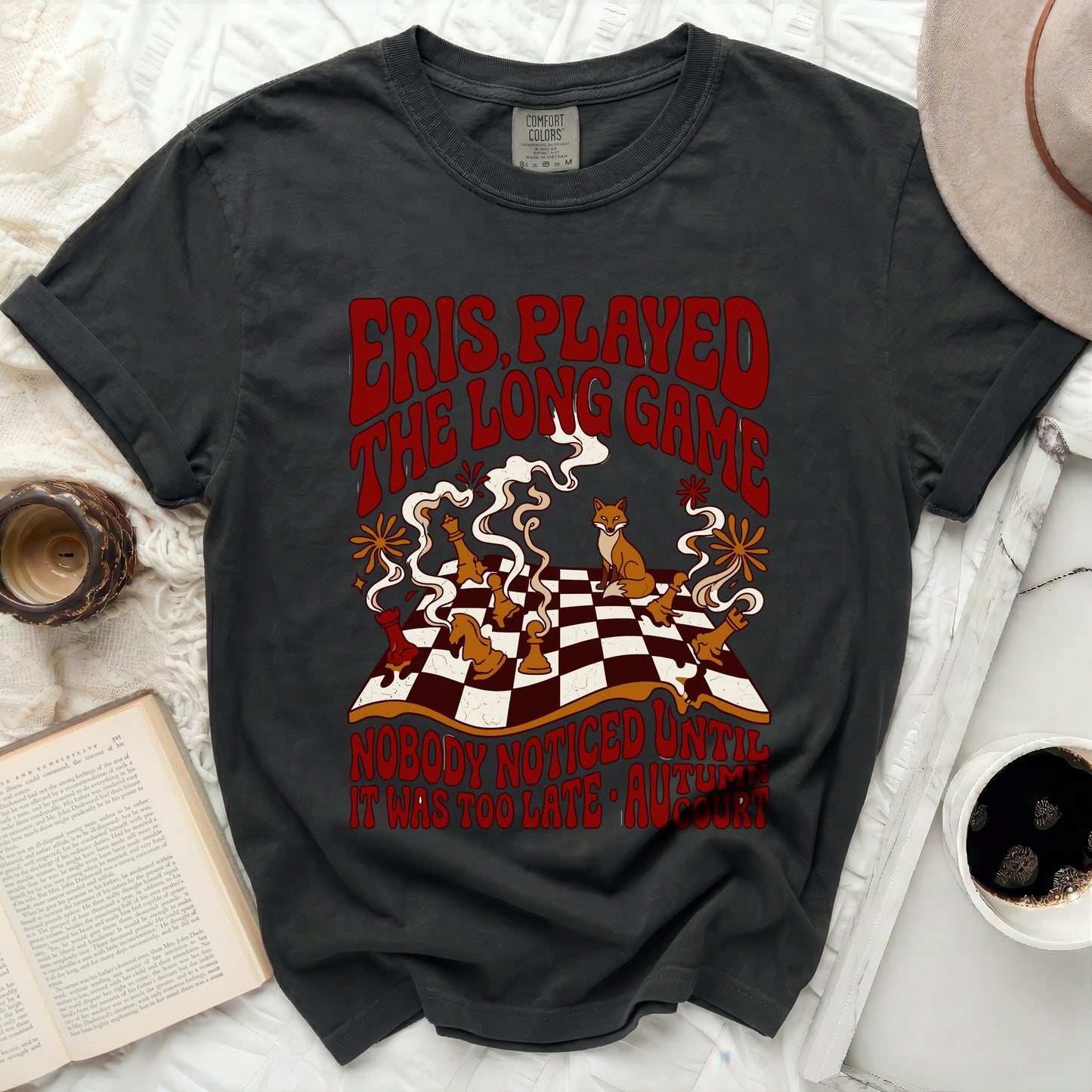 Dark gray t-shirt with "Eris Played the Long Game" text and chess pieces.