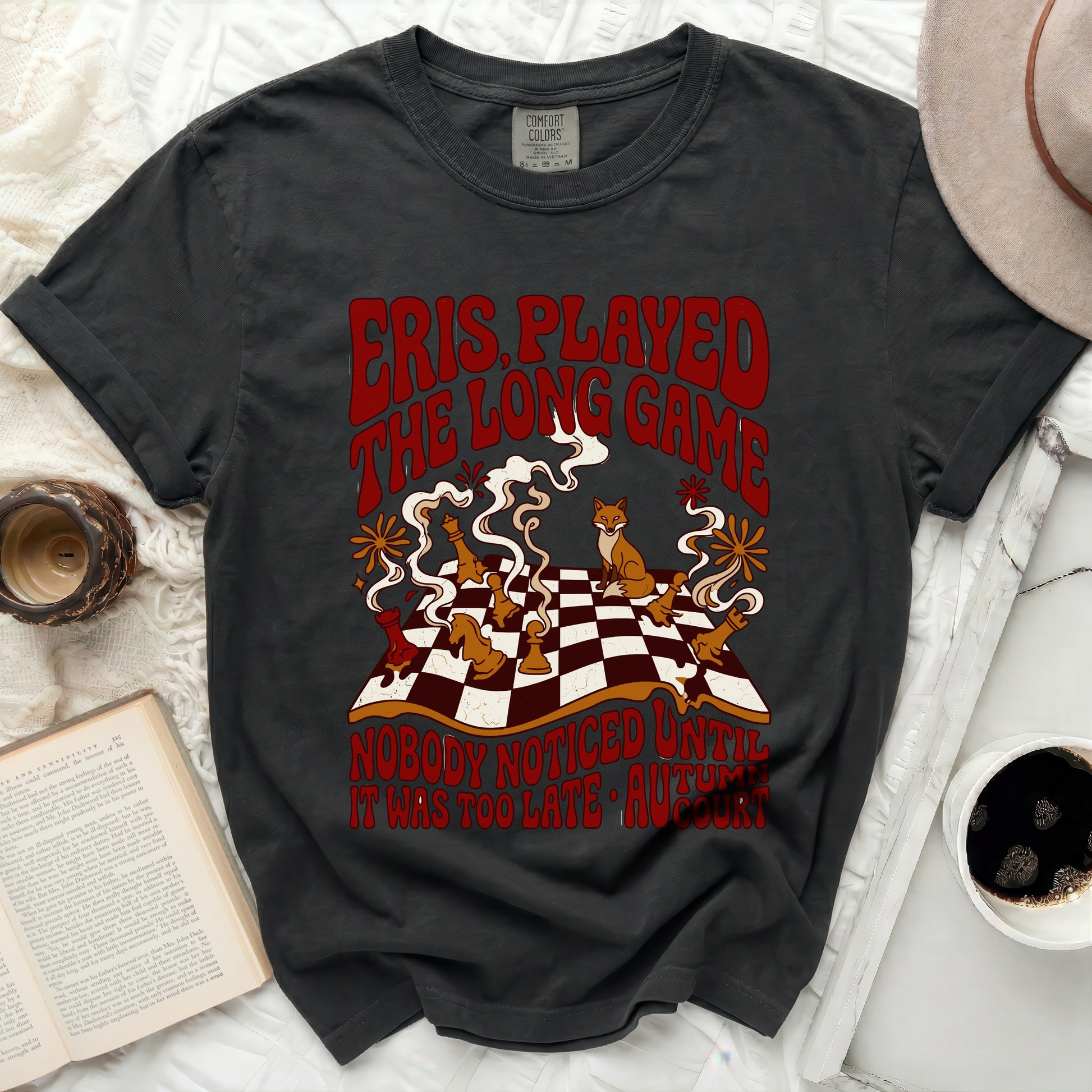 Dark gray t-shirt with "Eris Played the Long Game" text and chess pieces.