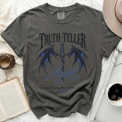 Grey t-shirt with "TRUTH-TELLER" and "Azriel" printed on it.