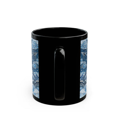 A black ceramic mug featuring a blue, starry night sky pattern wrapping around both sides of the handle.