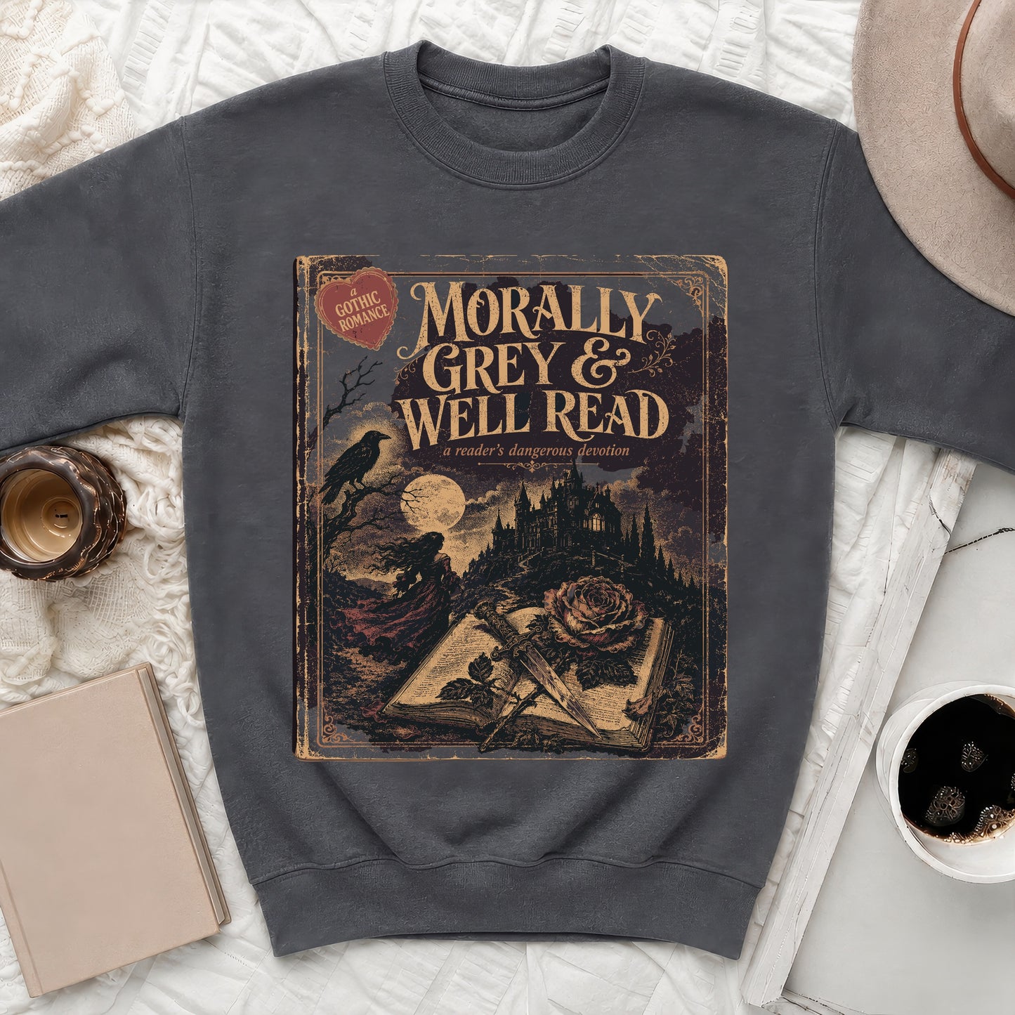 Crewneck sweatshirt with "Morally Grey & Well Read" book graphic and gothic romance theme.