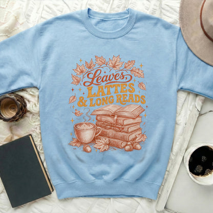 Light blue sweatshirt with "Leaves, Lattes & Long Reads" graphic.