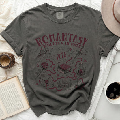 Dark grey t-shirt with "Romantasy Written in Fate 2026" and fantasy illustrations.