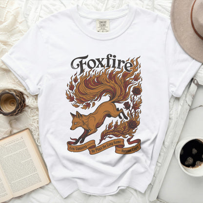 White t-shirt with a running fox and flames design.