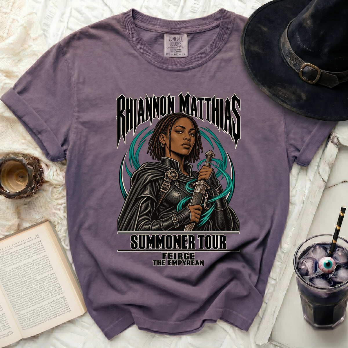 Purple t-shirt with "Rhiannon Matthias Summoner Tour" and dragon graphic.
