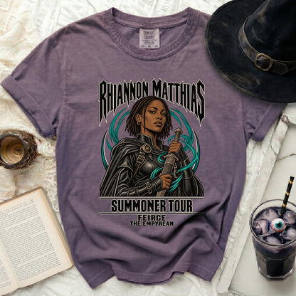 Purple t-shirt with "Rhiannon Matthias Summoner Tour" and dragon graphic.