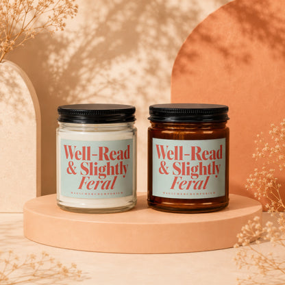 Two candles labeled "Well-Read & Slightly Feral" by MAGICMERCH having Emporium.