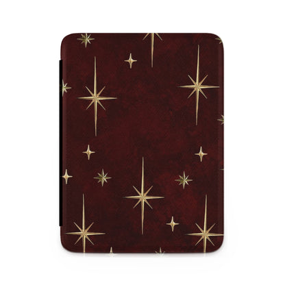 Dark red case with a pattern of gold starbursts and stars.