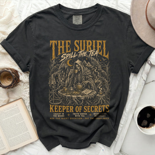 The Suriel "Spill the Tea" graphic tee with a grim reaper drinking tea.