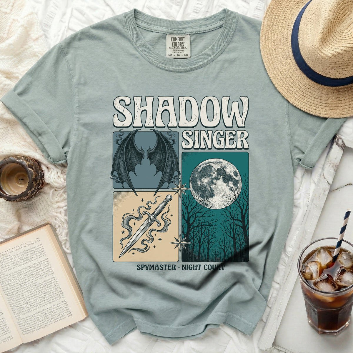 Shadow Singer t-shirt with dragon wings, dagger, moon, and trees graphic.