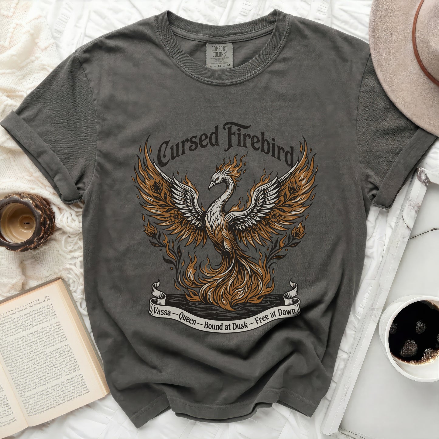 Dark gray t-shirt with a fiery phoenix graphic and text.
