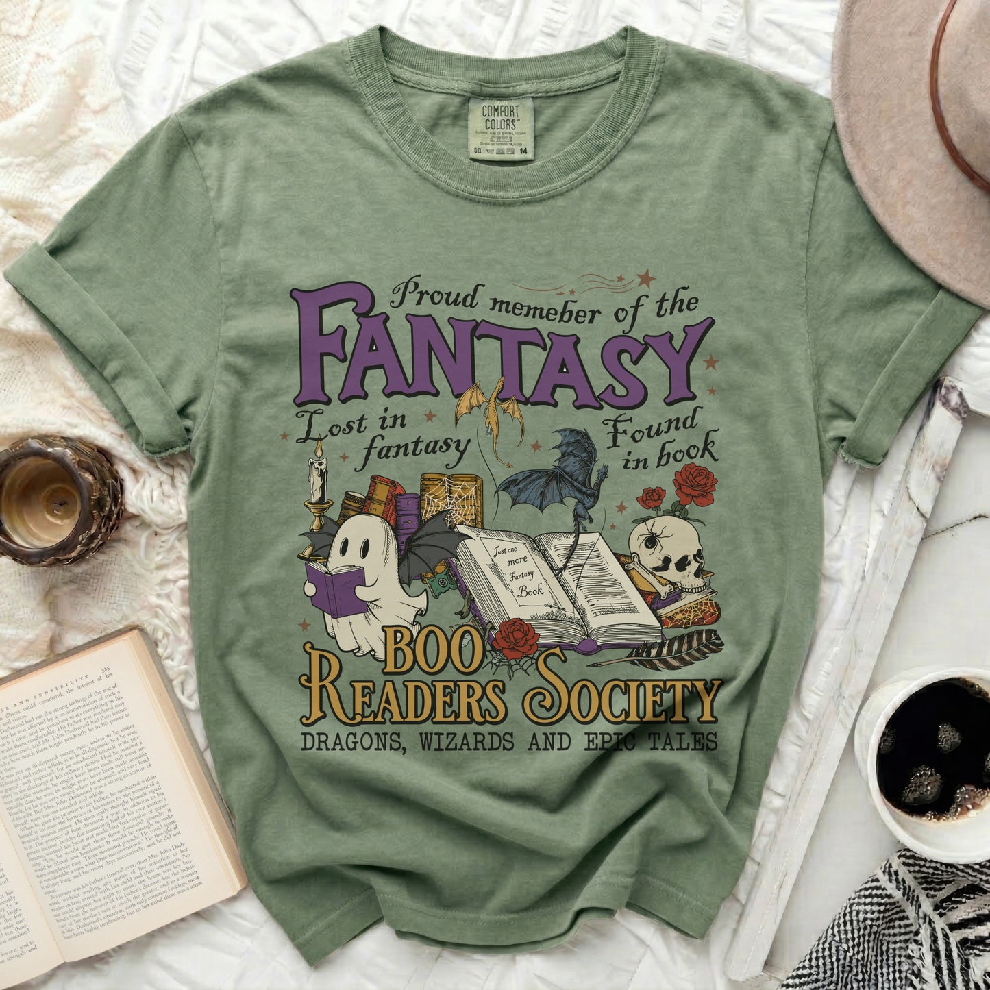 Green t-shirt with fantasy graphics and "Boo Readers Society" text.