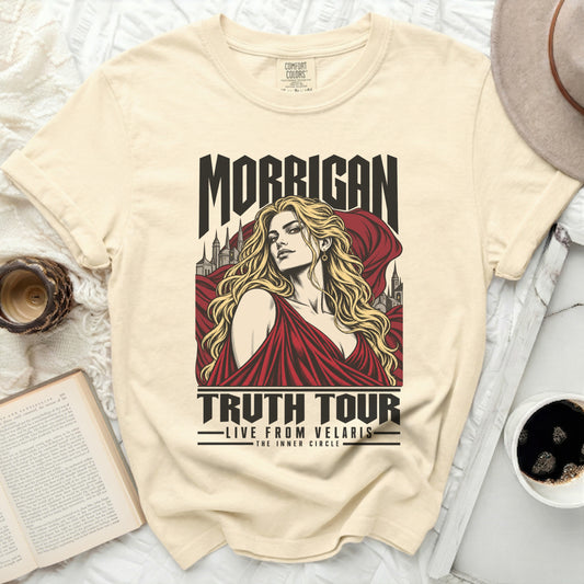 Cream t-shirt with Morrigan Truth Tour graphic featuring a woman and castles.
