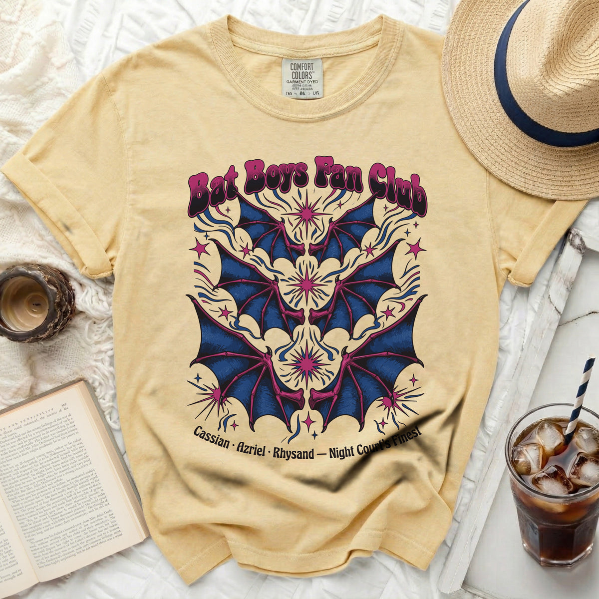 Yellow t-shirt with "Bat Boys Fan Club" and bat wings graphic.