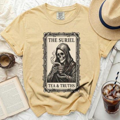 Grim reaper holding cup with text "THE SURIEL TEA & TRUTHS"