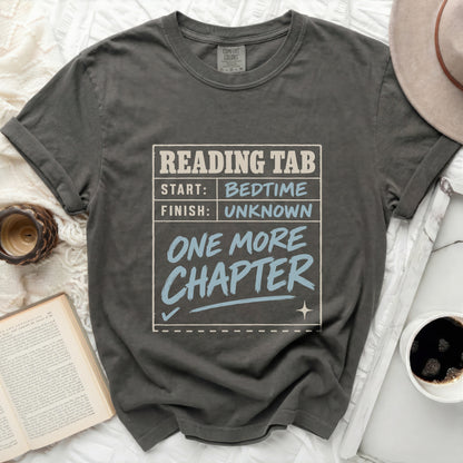 Comfort Colors t-shirt with "Reading Tab: Start Bedtime, Finish Unknown, One More Chapter" graphic.