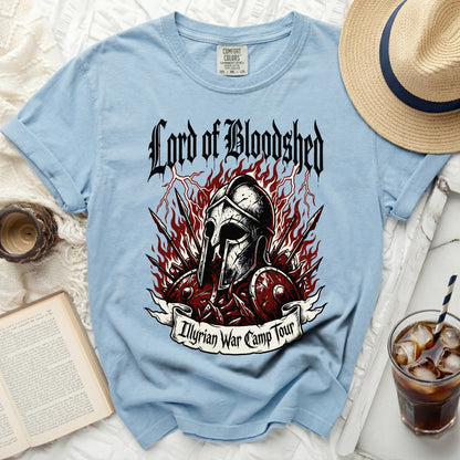Light blue t-shirt with "Lord of Bloodshed" and "Illyrian War Camp Tour" graphics.