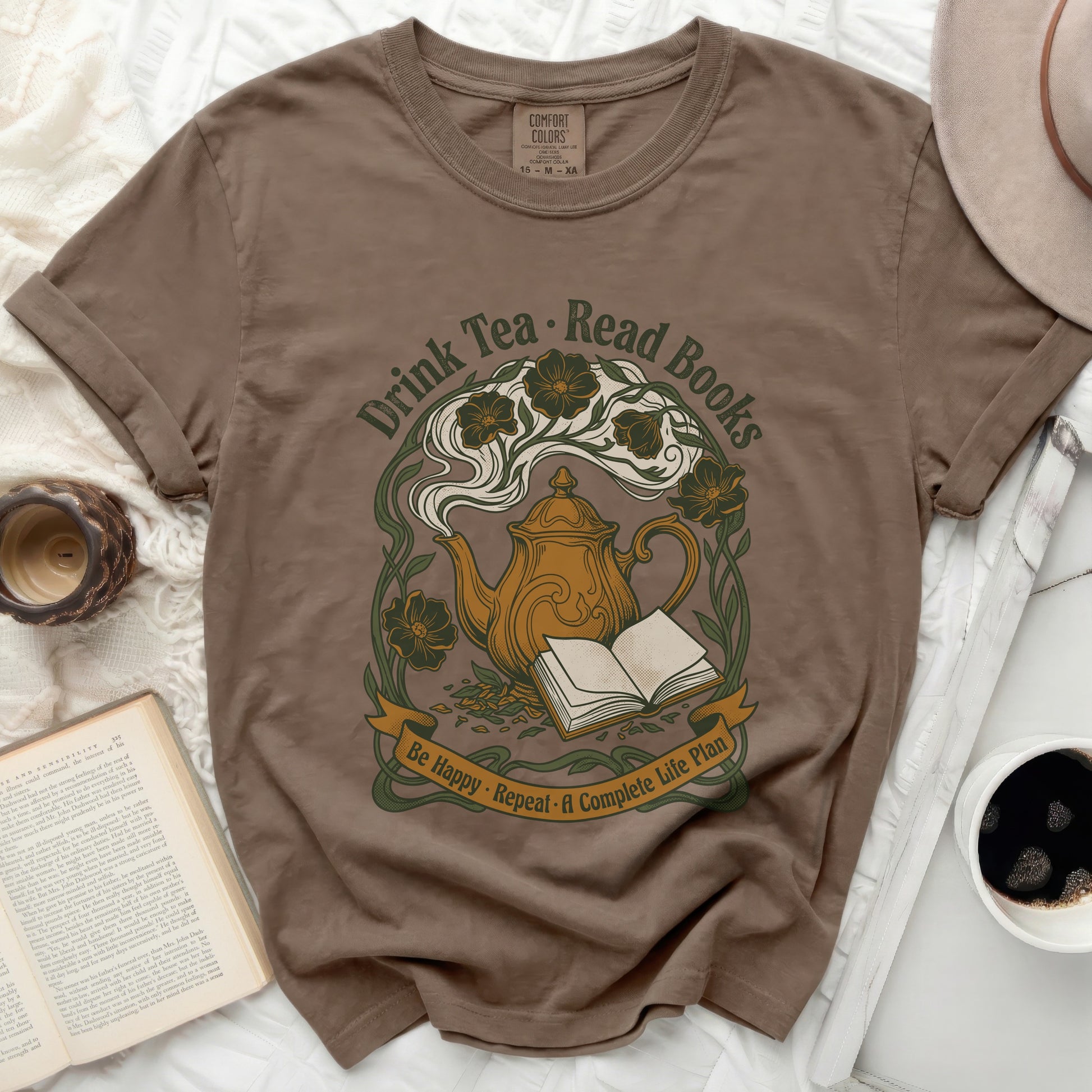 T-shirt with "Drink Tea • Read Books" and teapot graphic.