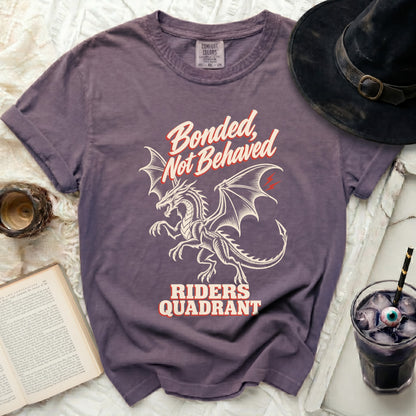 Purple t-shirt with dragon graphic and text "Bonded, Not Behaved RIDERS QUADRANT".