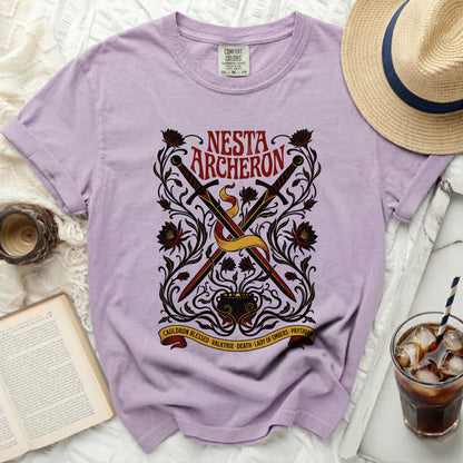 Purple Comfort Colors t-shirt with Nesta Archeron sword and cauldron graphic.