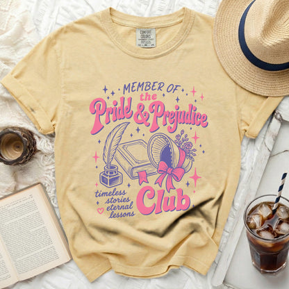 Yellow t-shirt with "Member of the Pride & Prejudice Club" graphic.