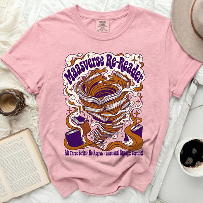 Pink t-shirt with "Maasverse Re-Reader" and book tornado design.