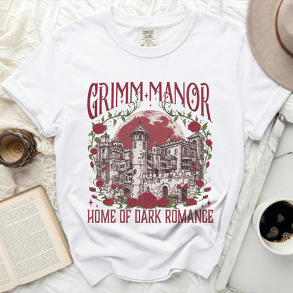 White t-shirt with "Grimm Manor Home of Dark Romance" graphic.