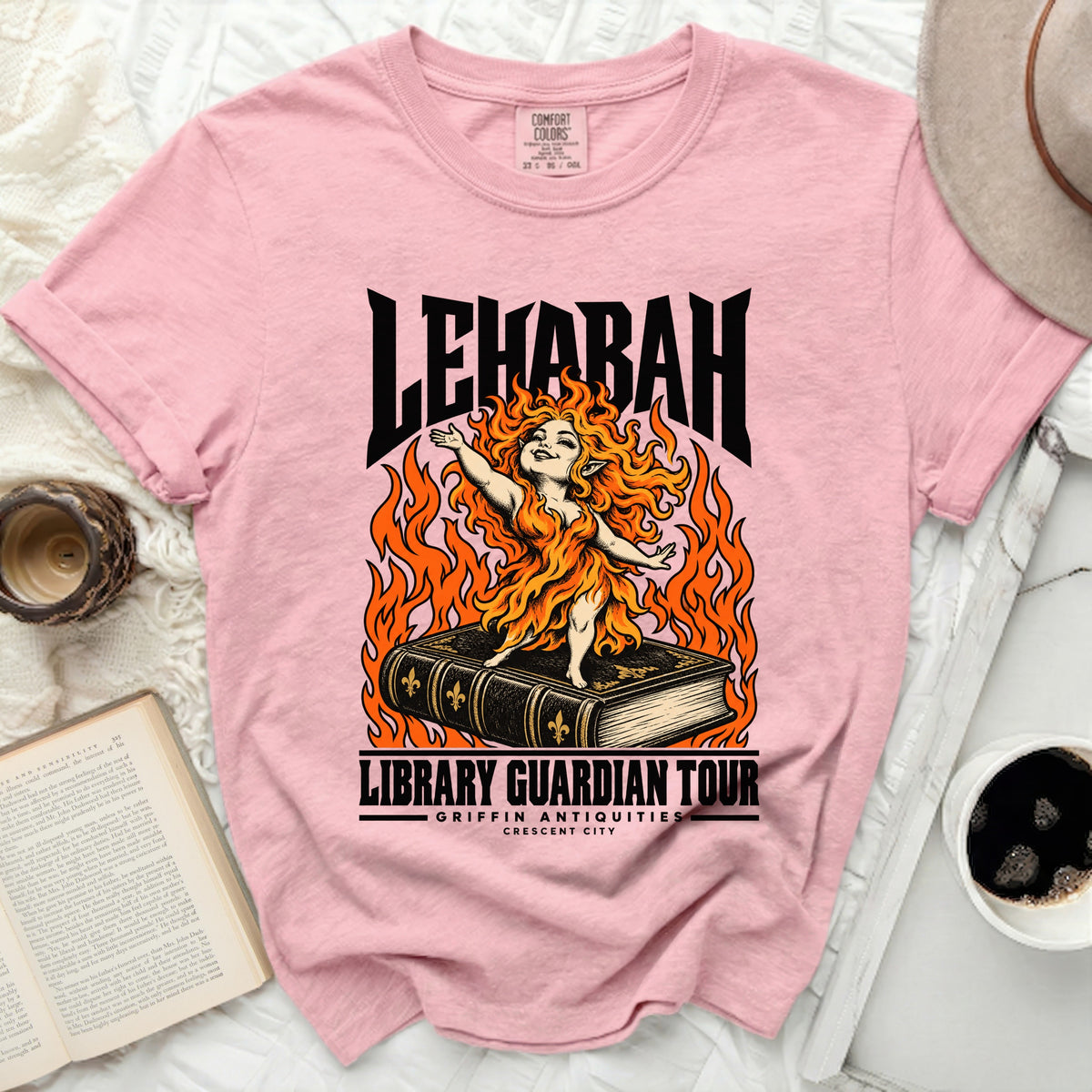 Pink t-shirt with "LEHABAH LIBRARY GUARDIAN TOUR" graphic.