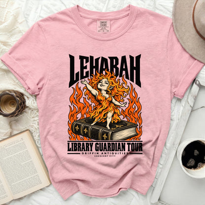 Pink t-shirt with "LEHABAH LIBRARY GUARDIAN TOUR" graphic.