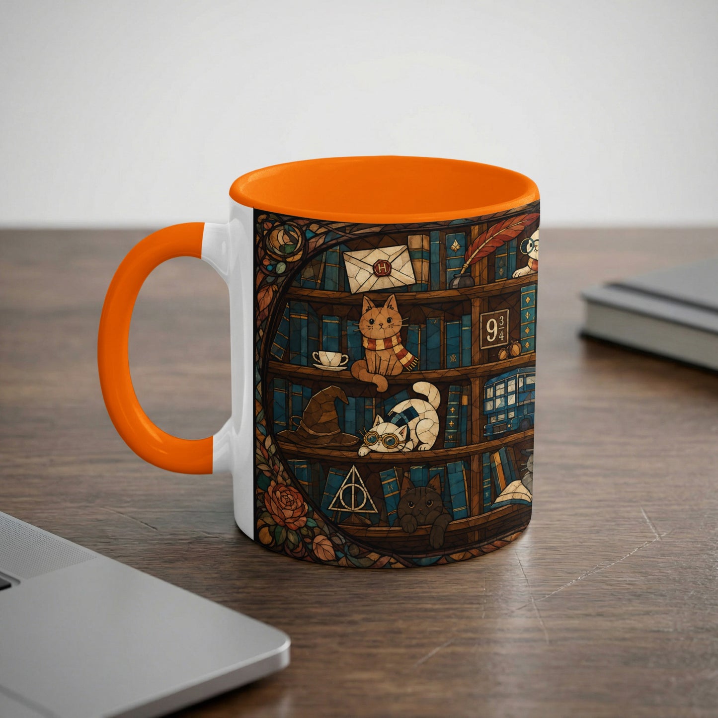 White mug with orange handle featuring cats and magical symbols on bookshelves.
