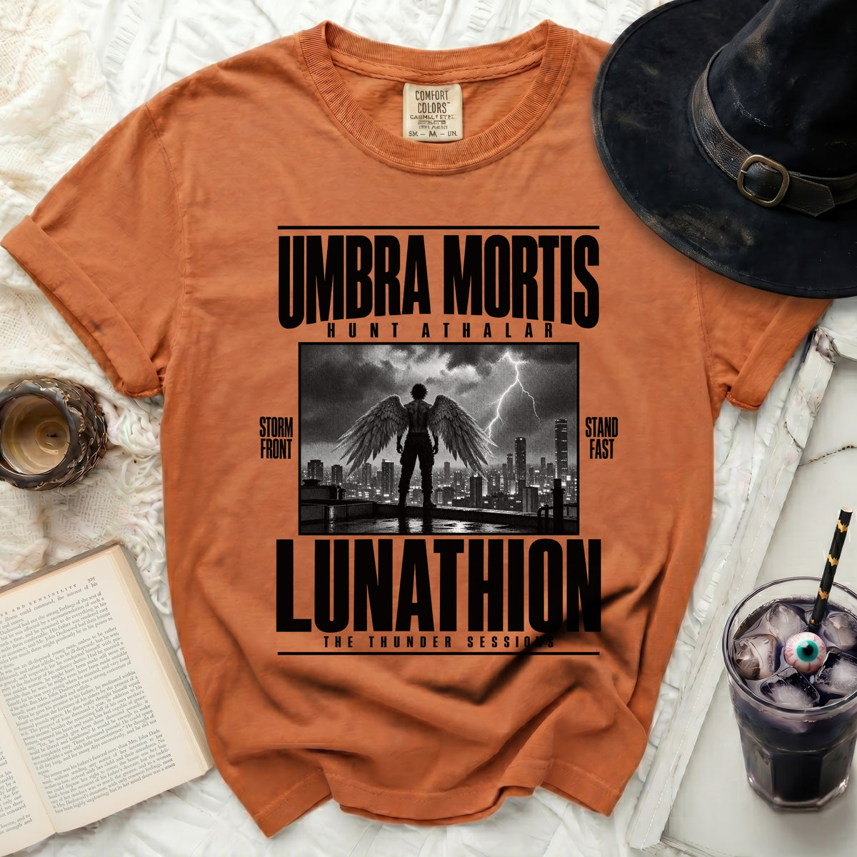 Orange t-shirt with Umbra Mortis Hunt Athalar Lunathion graphic.