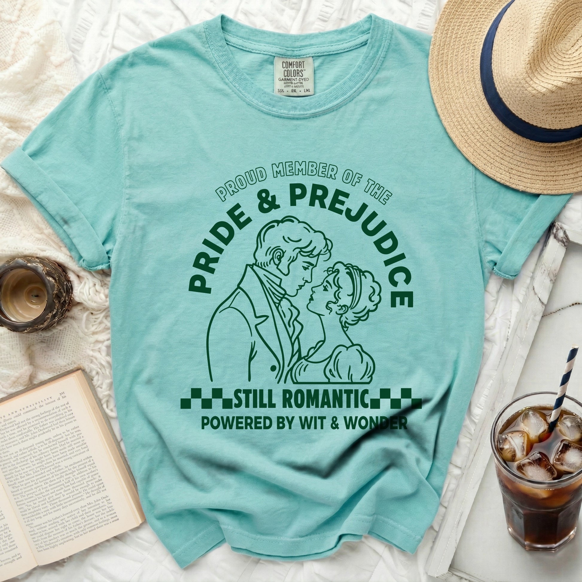 Aqua t-shirt with "Pride & Prejudice Still Romantic" graphic and literary quotes.