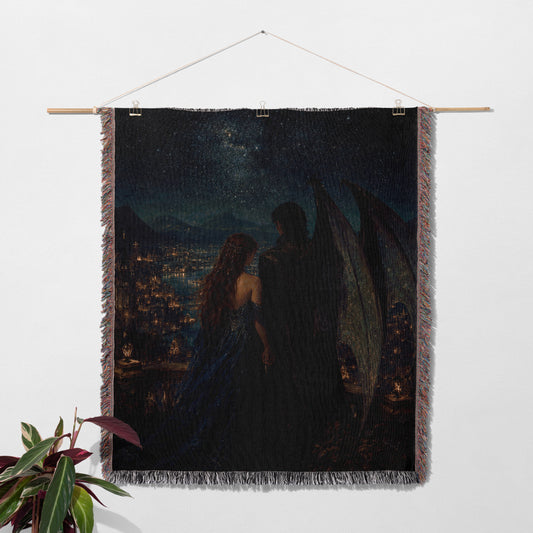 a large tapestry hanging on a wall, depicting a couple standing together under a starry night sky.