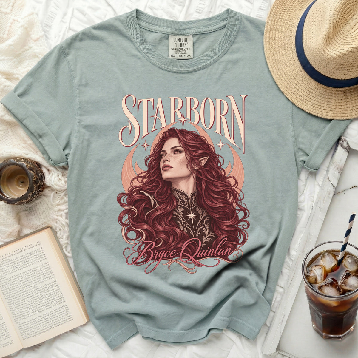 "Starborn" t-shirt with Bryce Quinlan illustration and celestial accents.