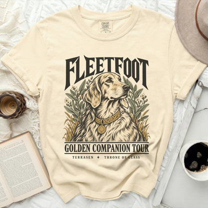 Light yellow t-shirt with Fleetfoot Golden Companion Tour graphic featuring a dog.