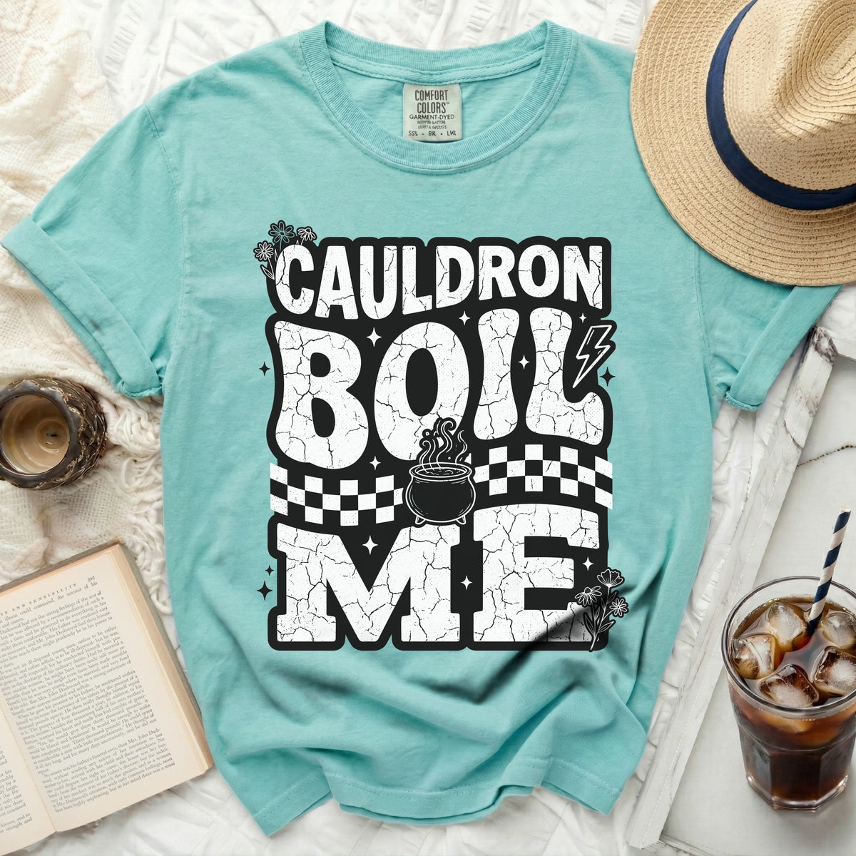 Teal t-shirt with "Cauldron Boil Me" in distressed white lettering.