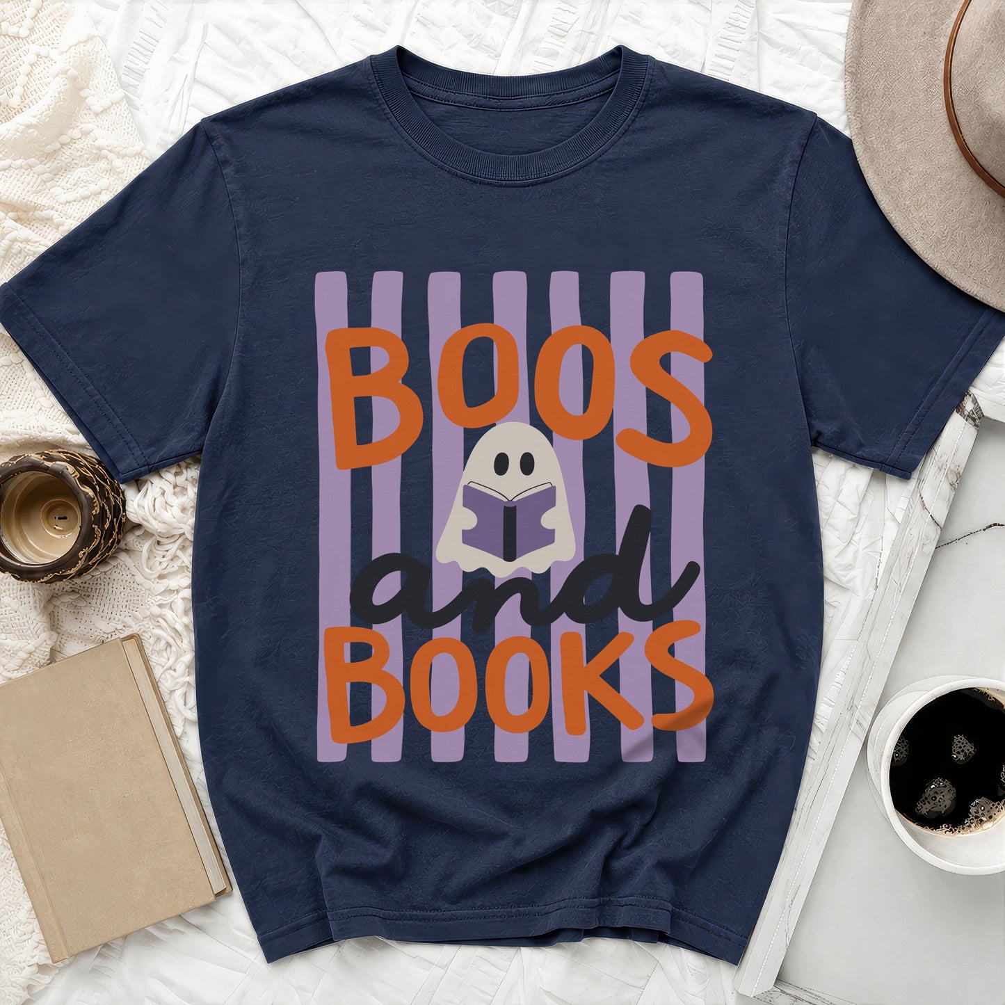 Navy t-shirt with "Boos and Books" Halloween graphic and a reading ghost.